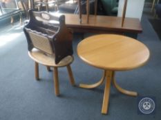 A circular pine pedestal occasional table together with a pine stool and a magazine rack