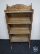 A set of oak Arts & Crafts open bookshelves