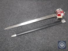 A reproduction Andrea Ferara basket handled Scottish broadsword in scabbard
