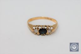 An 18ct gold sapphire and diamond ring,