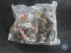 A bag containing a large quantity of costume jewellery