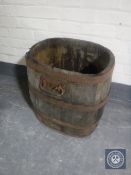 An oak coopered grape carrier