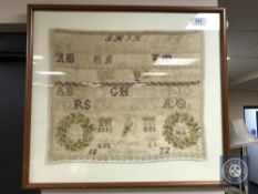 A 19th century continental needlework alphabet sampler by Marie Andersen,