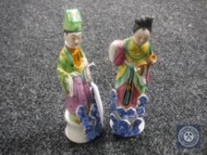 A pair of early 20th century Chinese figures, height 16 cm.