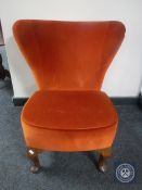 A mid 20th century bedroom chair