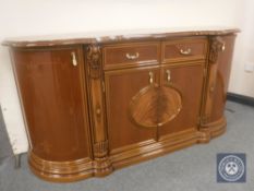 A shaped Italian style sideboard in a high gloss finish