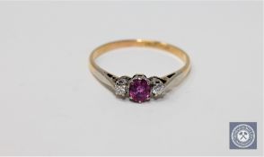 An 18ct gold ruby and diamond ring