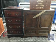 A reproduction mahogany audio cabinet and a TV cabinet