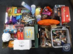 Four boxes of toys, action figures, buildable robots etc.