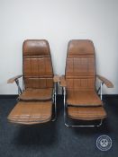 A pair of 20th century tubular metal folding garden armchairs