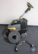 A Karcher professional 38-12C floor cleaner