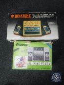 A boxed Adman Grandstand video game together with a boxed Binatone colour TV game