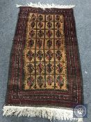 An Afghan rug,