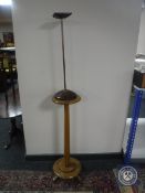 An inlaid oak Arts and Crafts smoker's stand and a pine plant pedestal