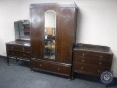 A 1930's three piece oak bedroom suite