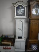 An early 20th century continental white and gilt painted longcase clock