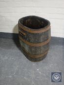 An oak coopered grape carrier