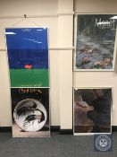 A framed Kastrup airport poster and three framed gallery prints