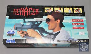 A Sega Mega Drive 'Menacer', boxed in retail condition.