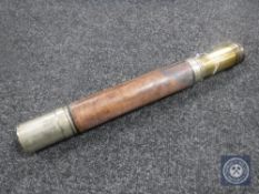 A World War II leather sleeved brass telescope by W Ottway & Co. Ltd no. 5910.