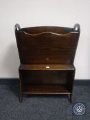 A 20th century oak magazine rack