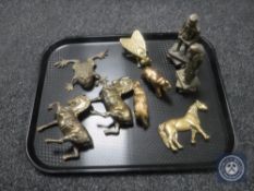 A tray of nine brass ornaments - Dickens figures, horses,
