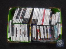 A box of computer games including Xbox, Xbox 360, Playstation 2 & 3, Nintendo Wii,