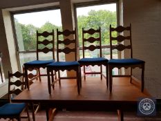 A set of six blonde oak dining chairs