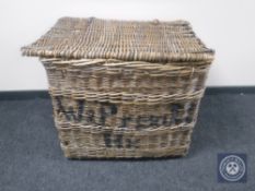 A large vintage wicker laundry hamper