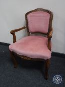 A salon armchair in pink dralon