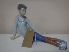 A Lladro figure - Seated dancer