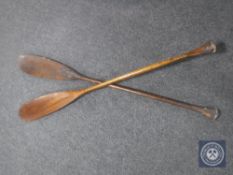 A pair of vintage wooden oars