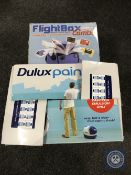 A boxed Ripmax flight box and contents and a Dulux paint pod