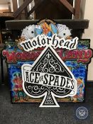 A Motorhead Ace of Spades sign (signed to rear),