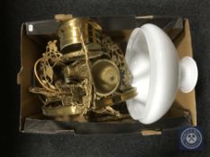 An antique brass rise and fall hanging oil lamp with shade