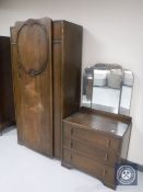 A 20th century oak single door wardrobe and dressing chest