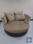 A love seat upholstered in two tone fabric