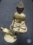 A brass figure of Buddha together with a brass horse on plinth