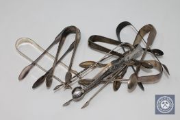 Eight pairs of Georgian silver sugar tongs,