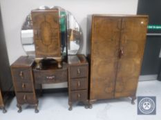 A 1930's Art Deco walnut tall boy, matching knee hole dressing table,