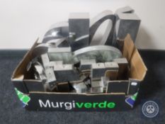 A box of metal shop letters
