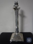 A silver plated Corinthian column lamp base
