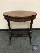 A Victorian walnut work table,