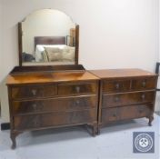 A walnut dressing chest and matching four drawer chest