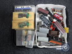 A tray of boxed and unboxed rolling stock including Lilliput engines,