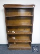 A continental oak open bookcase