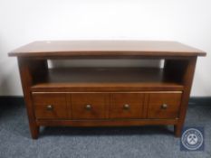 A contemporary TV stand fitted a drawer