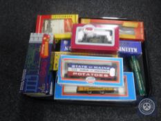 A tray of rolling stock, Dapol terrier engine,