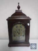 A German bracket clock on bun feet