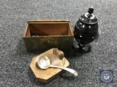 A turned lignum vitae pot together with an Eastern brass casket containing a pair of earrings,